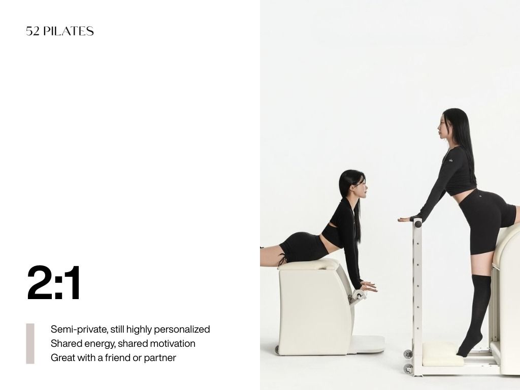 Two clients training together in a 52 Pilates private session